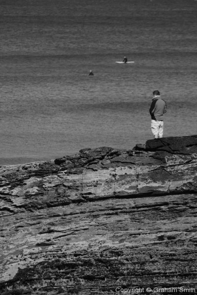 Pensive gaze out to sea - black and white