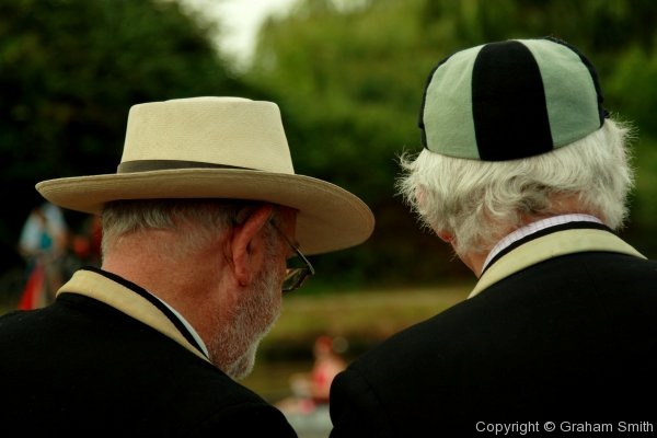 Old boys from Gonville & Caius College discussing the programme at the 2007 May Bumps rowing regatta, Cambridge